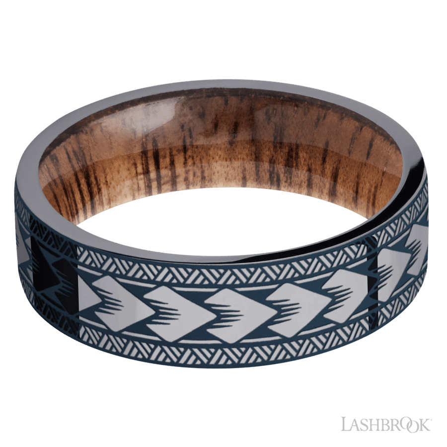 7 mm wide/Flat/Tantalum band with a laser carved Maori pattern also featuring a Koa sleeve.
