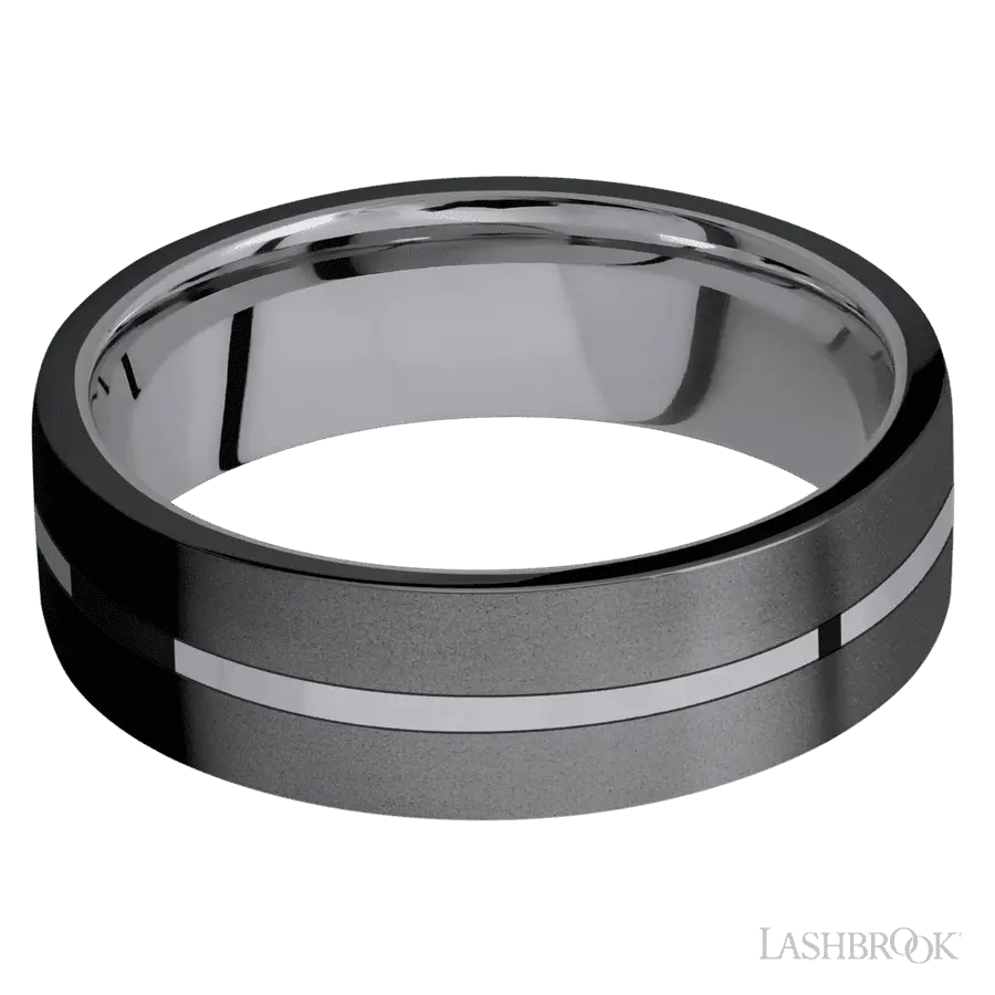 7 mm wide/Flat/Tantalum band with two 3 mm Double Off Center Edge inlays of Zirconium.