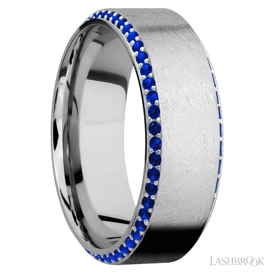 8 mm wide/High Bevel/14K White Gold band with a Bevel Eternity arrangement of .01 carat Round Sapphire stones in a Bead setting.