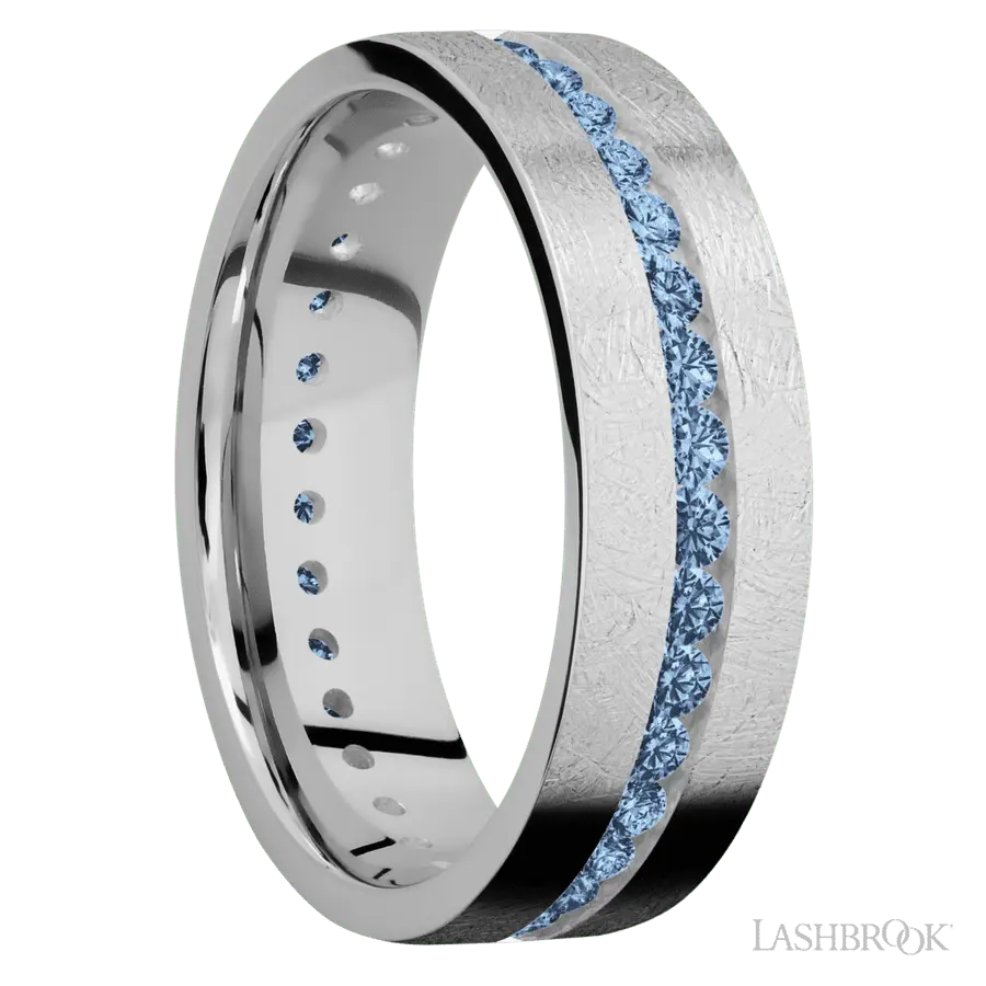 7 mm wide/Flat/14K White Gold band with an Eternity arrangement of .03 carat Round Denim Sapphire stones in a Channel setting.