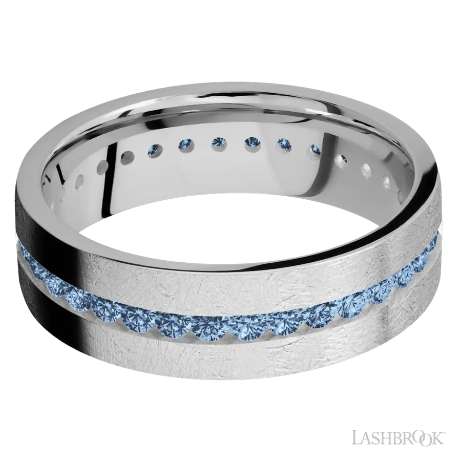 7 mm wide/Flat/14K White Gold band with an Eternity arrangement of .03 carat Round Denim Sapphire stones in a Channel setting.