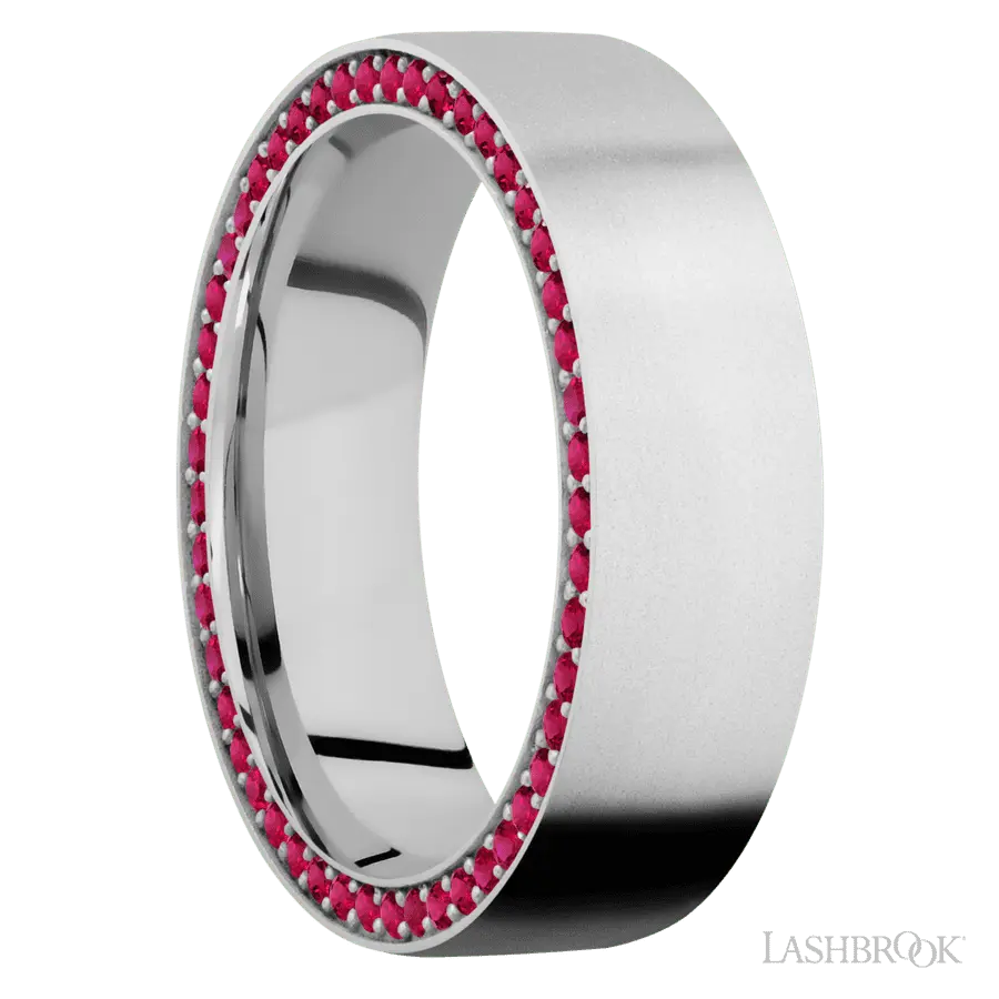 7 mm wide/Flat/14K White Gold band with a Side Eternity arrangement of .01 carat Round Ruby stones in a Bead Channel setting.