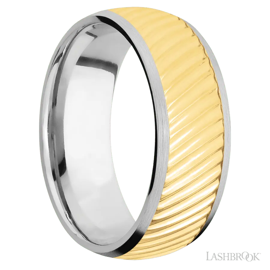 8 mm wide/Domed/14K White Gold band with one 6 mm Centered inlay of 14K Yellow Gold with a machined Ripple pattern. Lashbrook
