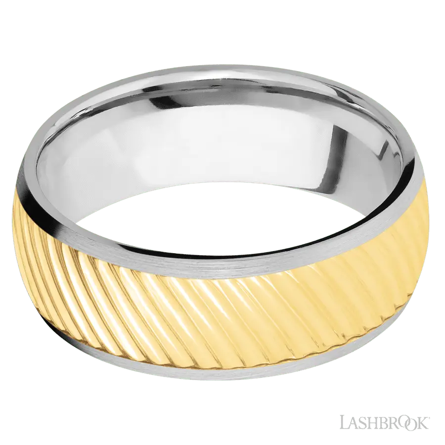 8 mm wide/Domed/14K White Gold band with one 6 mm Centered inlay of 14K Yellow Gold with a machined Ripple pattern. Lashbrook