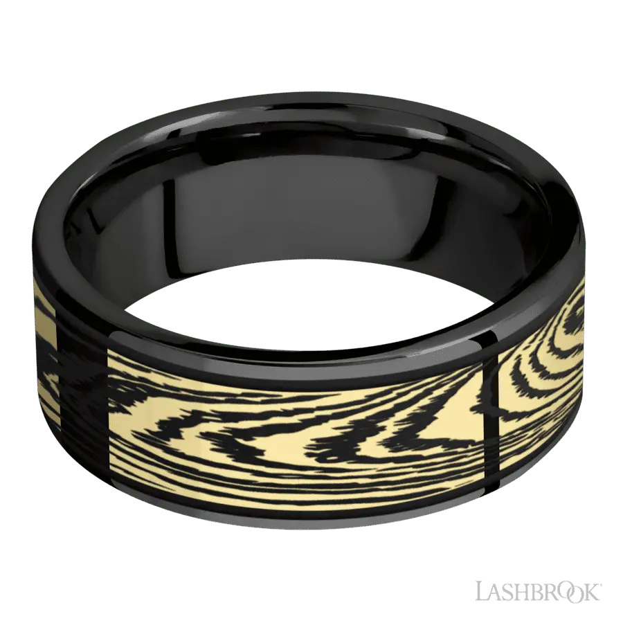 8 mm wide/Flat/Zirconium band with one 6 mm Centered inlay of 14K Yellow Gold with a laser carved Woodgrain pattern.