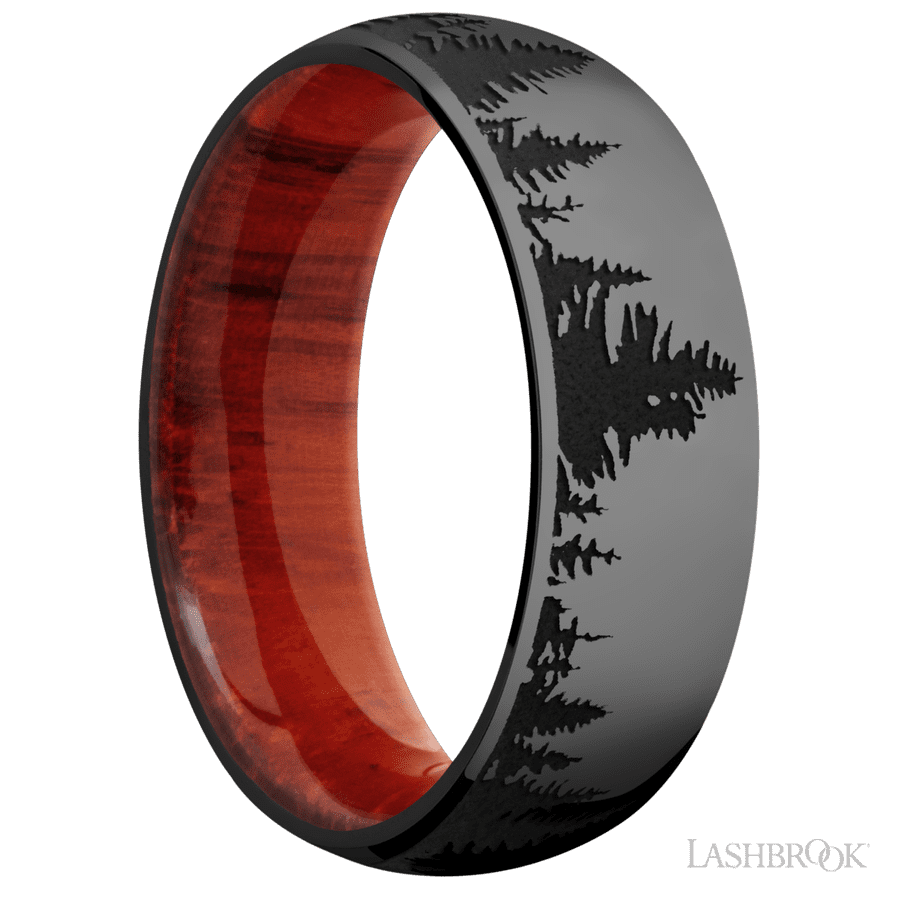 7 mm wide/Domed/Zirconium band with a laser carved Trees pattern also featuring a Padauk sleeve.