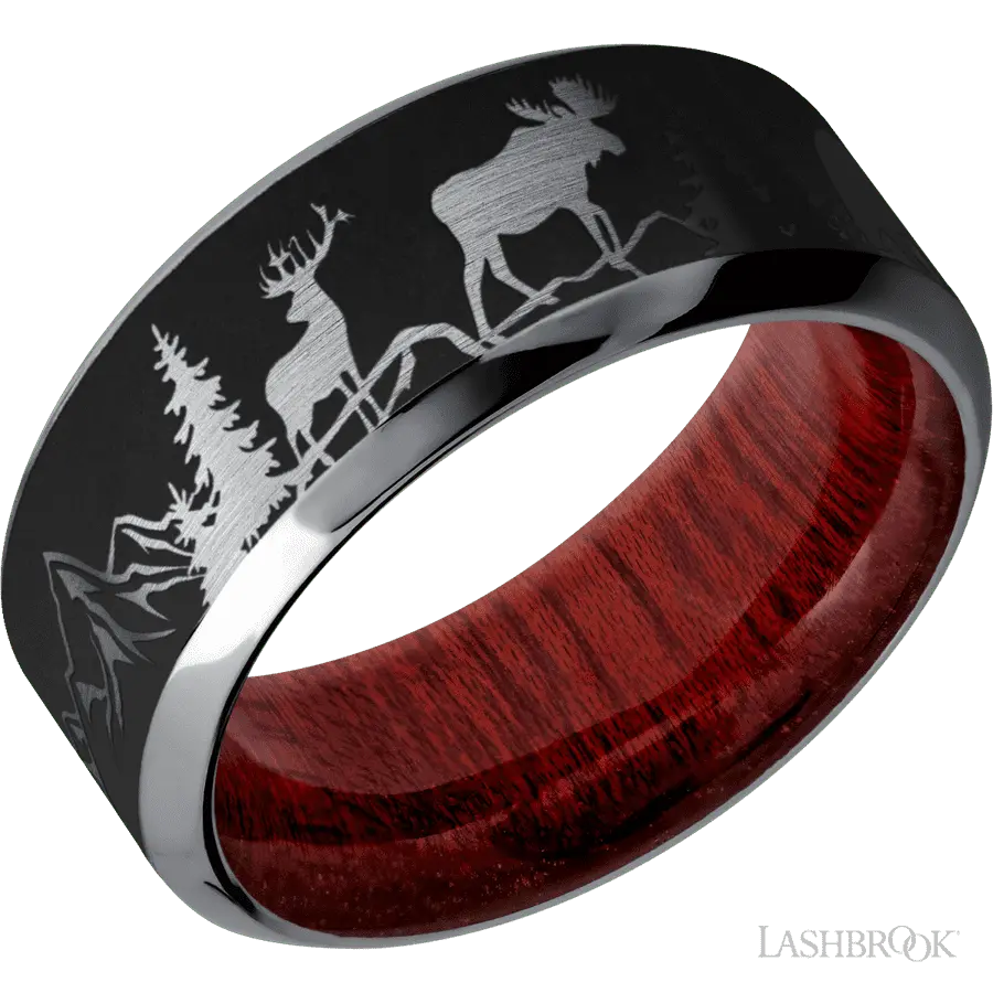 9 mm wide/High Bevel/Tantalum band with a laser carved Bear Moose Deer Mountain pattern also featuring a Blood Wood sleeve. i