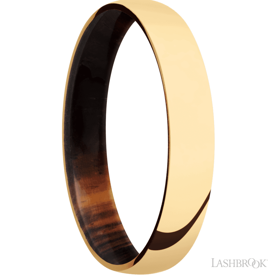 4 mm wide Domed 14K Yellow Gold band featuring a Cocobolo sleeve.