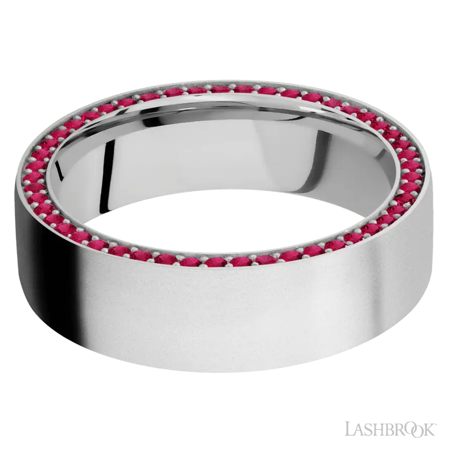 7 mm wide/Flat/14K White Gold band with a Side Eternity arrangement of .01 carat Round Ruby stones in a Bead Channel setting.