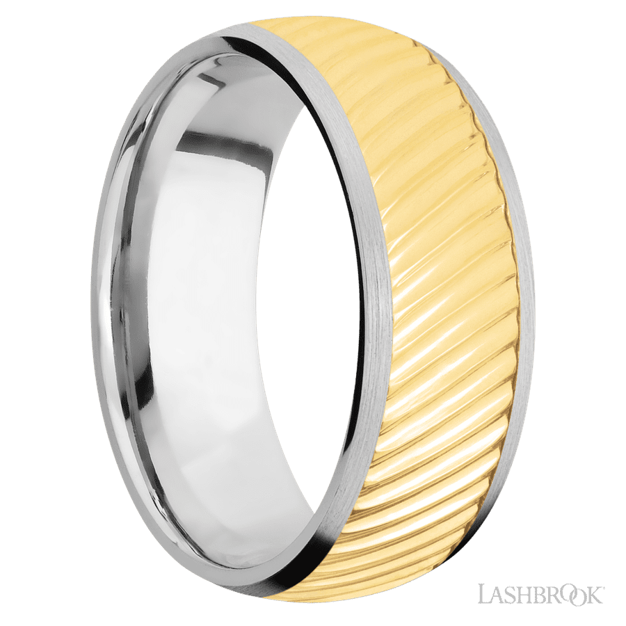 8 mm wide/Domed/14K White Gold band with one 6 mm Centered inlay of 14K Yellow Gold with a machined Ripple pattern.