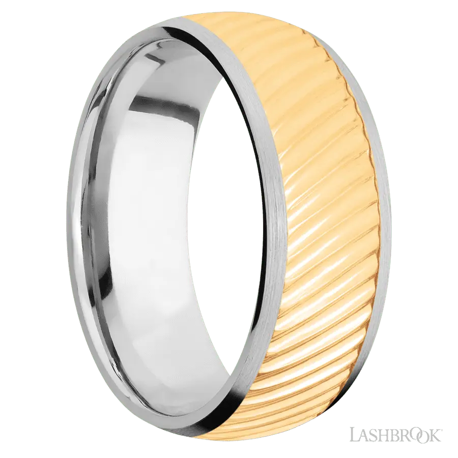 8 mm wide/Domed/14K White Gold band with one 6 mm Centered inlay of 14K Yellow Gold with a machined Ripple pattern.