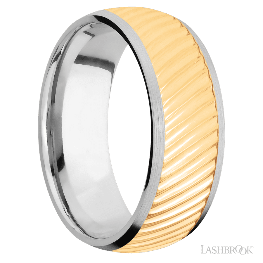 8 mm wide/Domed/14K White Gold band with one 6 mm Centered inlay of 14K Yellow Gold with a machined Ripple pattern.