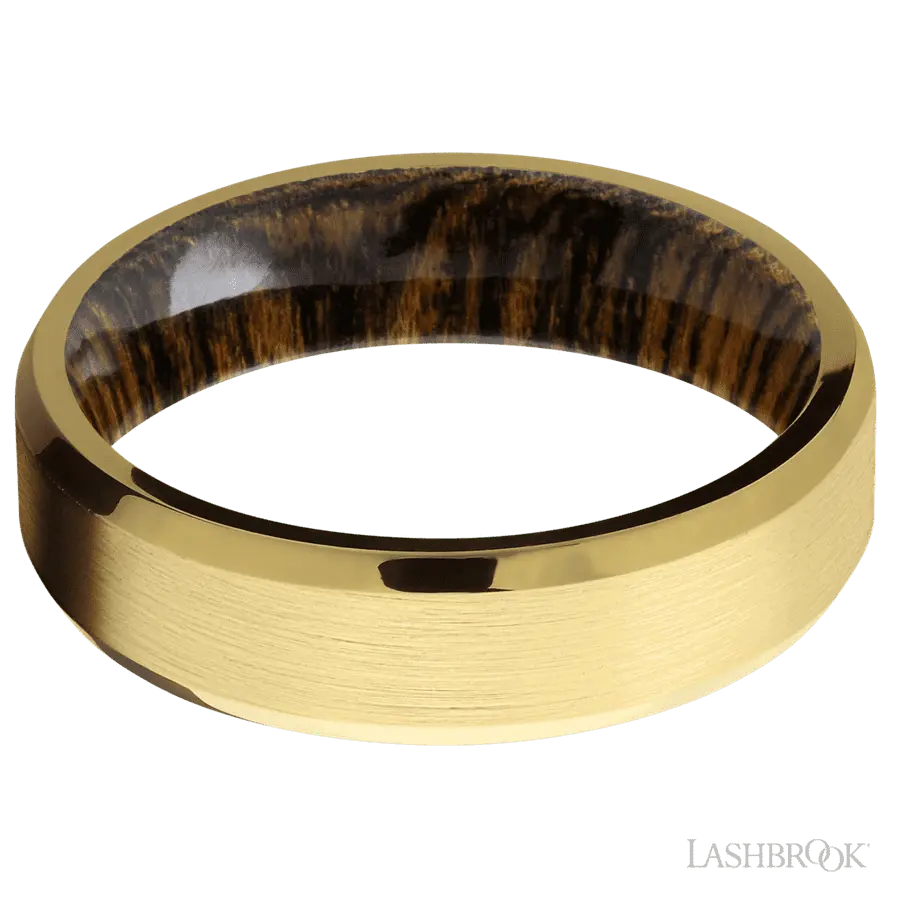 6 mm wide Beveled 18K Yellow Gold band featuring a Bocote sleeve. Lashbrook
