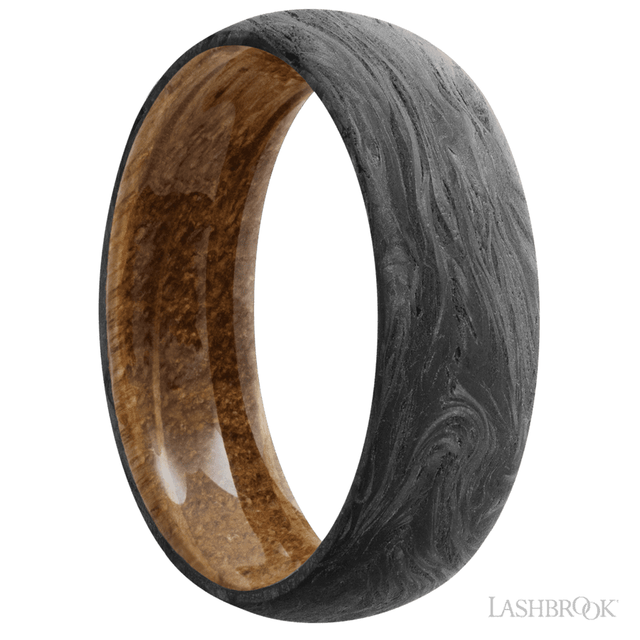7 mm wide Domed Forged Carbon Fiber band featuring a Whiskey Barrel sleeve.