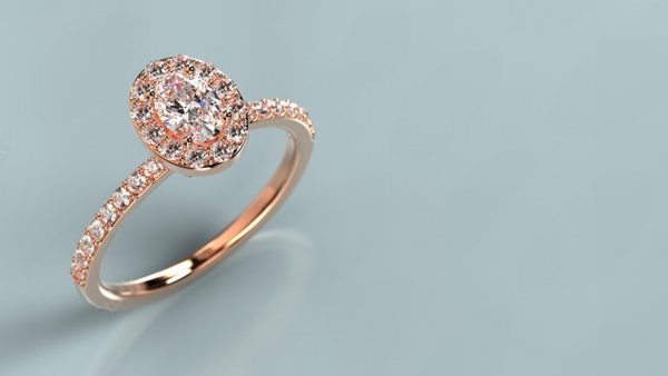 Rose Gold Engagement Ring Blue Background The Diamond Store USA