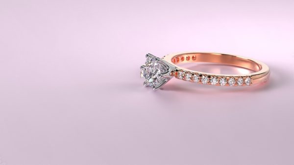 rose-gold-engagement-ring-pink-background-the-diamond-store-usa